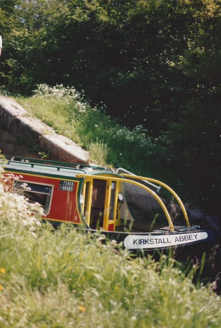 Canal boat emerging from lock