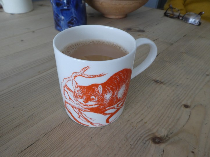 Cheshire cat cup of tea