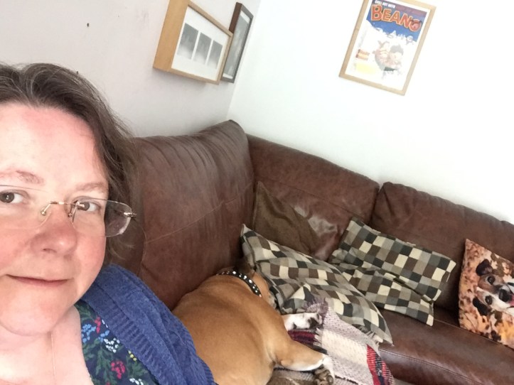 Shady and Janet waiting on the sofa